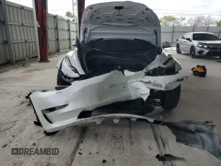 2023 Tesla Model 3 с VIN 5YJ3E1EA5PF514511, выставлен на аукционе Copart как лот 56653775 с пробегом Не указан миль и Списание • Salvage title. История ставок и продаж доступна на DreamBid. Изображение 5.