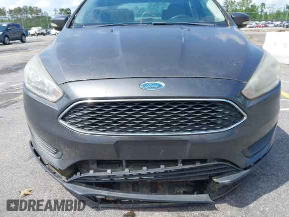 2016 Ford Focus SE with VIN 1FADP3F26GL207417, listed as a IAAI auction lot 42107442 with 116,700 mi miles. Bid and sale history available at carsss.com. Image 6.