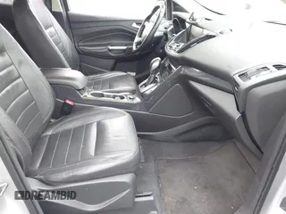 2014 Ford Escape Titanium с VIN 1FMCU0J98EUC28001, выставлен на аукционе IAAI как лот 42442784 с пробегом 163 159 миль миль и . История ставок и продаж доступна на DreamBid. Изображение 5.