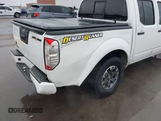 2014 Nissan Frontier SV with VIN 1N6AD0ER6EN751448, listed as a IAAI auction lot 41514633 with 238,204 mi miles and . Bid and sale history available at DreamBid. Image 19.