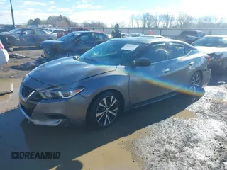 2016 Nissan Maxima Platinum with VIN 1N4AA6AP7GC409949, listed as a IAAI auction lot 41214746 with 190,853 mi miles and . Bid and sale history available at DreamBid. Image 22.