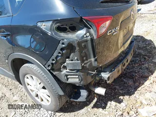 2014 Mazda CX-5 Touring with VIN JM3KE4CY8E0333029, listed as a IAAI auction lot 41857199 with 218,887 mi miles. Bid and sale history available at carsss.com. Image 6.