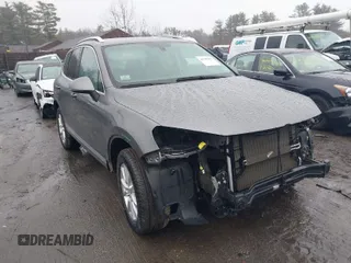 2013 Volkswagen Touareg Lux with VIN WVGEF9BP7DD007170, listed as a IAAI auction lot 41787075 with 131,089 mi miles and . Bid and sale history available at DreamBid. Image 1.