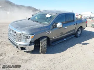 2017 Nissan Titan SV with VIN 1N6AA1E51HN537452, listed as a IAAI auction lot 41790728 with 82,521 mi miles. Bid and sale history available at carsss.com. Image 2.