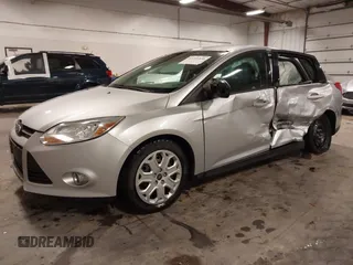 2012 Ford Focus SE z VIN 1FAHP3F21CL463704, wystawiony jako IAAI lot #42246436 z przebiegiem 234 474 mil mil oraz . Historia ofert i sprzedaży dostępna na DreamBid. Obrazek 19.