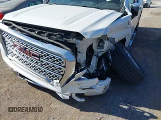 2020 GMC Sierra 1500 Denali with VIN 3GTU9FET8LG287861, listed as a IAAI auction lot 40678227 with 155,333 mi miles and . Bid and sale history available at carsss.com. Image 17.