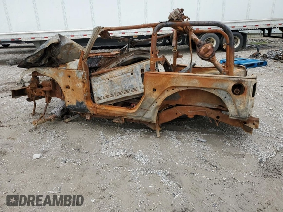2007 Jeep Wrangler Sahara with VIN 1J4FA541X7L219977, listed as a Copart auction lot 73509754 with Not provided miles and Salvage title. Bid and sale history available at DreamBid. Image 2.