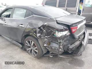 2016 Nissan Maxima SV z VIN 1N4AA6AP9GC388991, wystawiony jako IAAI lot #42110609 z przebiegiem 139 467 mil mil oraz . Historia ofert i sprzedaży dostępna na DreamBid. Obrazek 6.