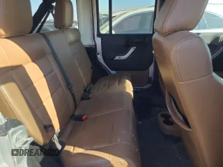 2012 Jeep Wrangler Unlimited Call of Duty MW3 с VIN 1C4BJWFG3CL103865, выставлен на аукционе Copart как лот 74237754 с пробегом 104 232 миль миль и Списание • Salvage title. История ставок и продаж доступна на DreamBid. Изображение 11.