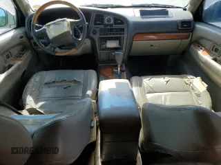 2001 Infiniti QX4 z VIN JNRDR09X51W201432, wystawiony jako Copart lot #54083295 z przebiegiem 211 929 mil mil oraz Szkoda całkowita • Salvage title. Historia ofert i sprzedaży dostępna na DreamBid. Obrazek 8.