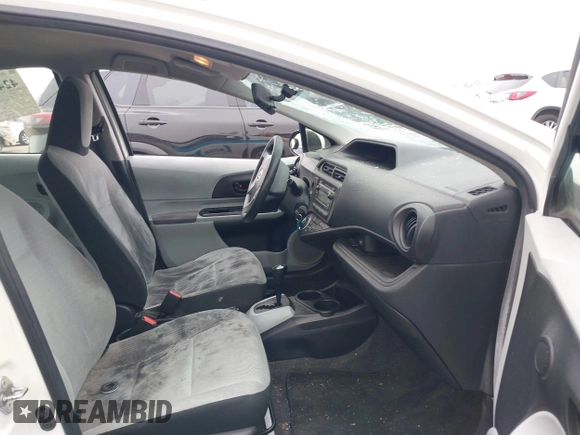2014 Toyota Prius One z VIN JTDKDTB33E1559405, wystawiony jako IAAI lot #42499928 z przebiegiem 182 388 mil mil oraz . Historia ofert i sprzedaży dostępna na DreamBid. Obrazek 5.
