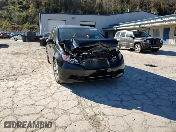 2014 Honda Odyssey EX-L with VIN 5FNRL5H69EB121140, listed as a Copart auction lot 79698724 with 169,626 mi miles and Salvage Title. Bid and sale history available at DreamBid. Image 12.