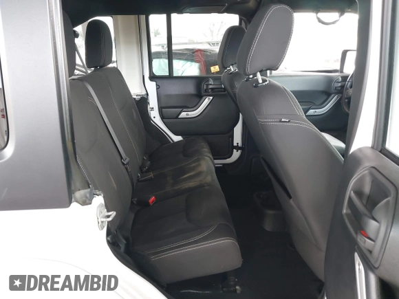2017 Jeep Wrangler Unlimited Sahara with VIN 1C4HJWEG0HL595144, listed as a IAAI auction lot 41644511 with 143,512 mi miles. Bid and sale history available at carsss.com. Image 8.