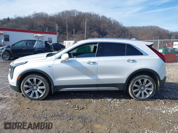 2020 Cadillac XT4 AWD Premium Luxury z VIN 1GYFZDR45LF016381, wystawiony jako IAAI lot #41556874 z przebiegiem 23 887 mil mil oraz . Historia ofert i sprzedaży dostępna na DreamBid. Obrazek 14.