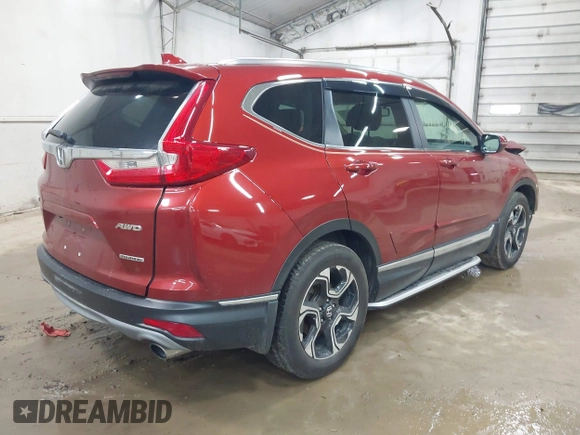 2017 Honda CR-V Touring with VIN 2HKRW2H95HH610401, listed as a IAAI auction lot 42177024 with 42,494 mi miles and . Bid and sale history available at carsss.com. Image 4.