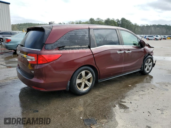 2018 Honda Odyssey EX-L z VIN 5FNRL6H75JB097041, wystawiony jako Copart lot #50617535 z przebiegiem 169 040 mil mil oraz Szkoda całkowita • Salvage title. Historia ofert i sprzedaży dostępna na DreamBid. Obrazek 3.