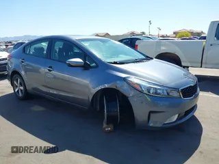 2018 Kia Forte LX with VIN 3KPFL4A77JE220538, listed as a IAAI auction lot 42095964 with 98,977 mi miles and . Bid and sale history available at DreamBid. Image 6.