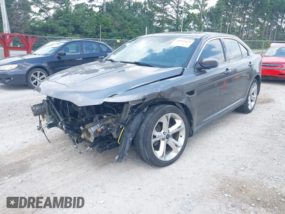 2011 Ford Taurus SHO with VIN 1FAHP2KT3BG144336, listed as a IAAI auction lot 42612624 with 201,182 mi miles and . Bid and sale history available at DreamBid. Image 2.