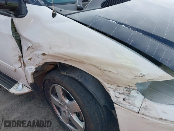 2005 Dodge Caravan SXT with VIN 2D4GP44L15R224531, listed as a IAAI auction lot 41590755 with 141,214 mi miles and . Bid and sale history available at DreamBid. Image 12.