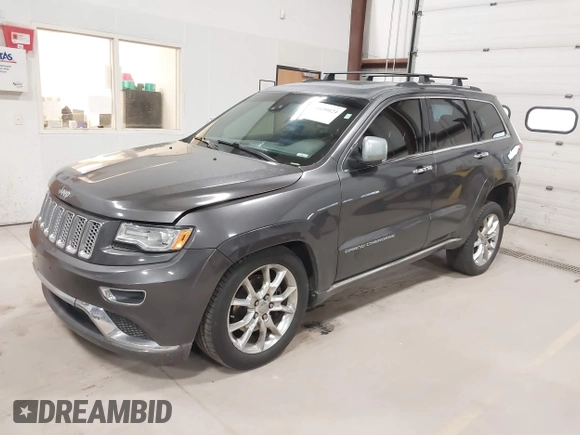 2015 Jeep Grand Cherokee Summit with VIN 1C4RJFJT6FC754799, listed as a IAAI auction lot 41699124 with 124,206 mi miles and . Bid and sale history available at DreamBid. Image 18.