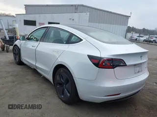 2018 Tesla Model 3 Long Range Battery with VIN 5YJ3E1EB4JF086012, listed as a IAAI auction lot 41683859 with 52,059 mi miles and . Bid and sale history available at DreamBid. Image 3.