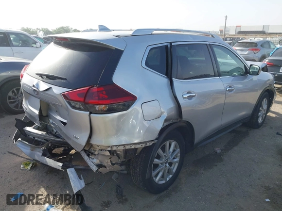 2019 Nissan Rogue SV with VIN KNMAT2MT0KP527901, listed as a IAAI auction lot 42260779 with 102,975 mi miles and . Bid and sale history available at DreamBid. Image 4.