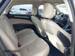 2016 Ford Fusion Titanium with VIN 3FA6P0SU9GR145186, listed as a IAAI auction lot 42023484 with 84,399 mi miles and . Bid and sale history available at DreamBid. Image 8.