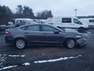 2015 Ford Fusion S Hybrid with VIN 3FA6P0UU2FR102241, listed as a IAAI auction lot 41003479 with 88,020 mi miles. Bid and sale history available at carsss.com. Image 12.