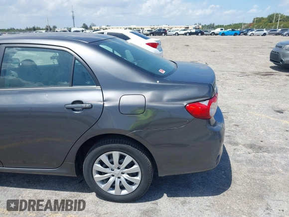 2013 Toyota Corolla L with VIN 2T1BU4EE7DC049698, listed as a IAAI auction lot 41978393 with 48,901 mi miles. Bid and sale history available at carsss.com. Image 12.