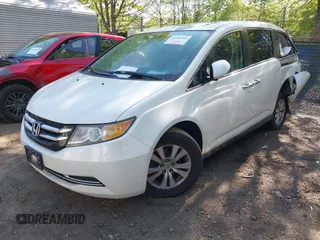 2014 Honda Odyssey EX-L with VIN 5FNRL5H63EB064854, listed as a IAAI auction lot 42102704 with 148,536 mi miles and . Bid and sale history available at carsss.com. Image 2.