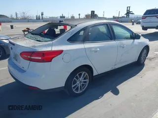 2017 Ford Focus SE with VIN 1FADP3F25HL221763, listed as a IAAI auction lot 41995746 with 101,369 mi miles and . Bid and sale history available at DreamBid. Image 4.