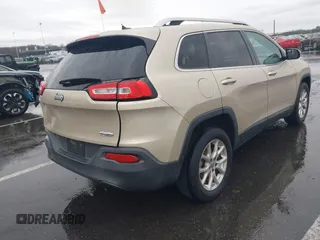 2014 Jeep Cherokee Latitude with VIN 1C4PJLCB8EW191911, listed as a IAAI auction lot 41956728 with 123,643 mi miles. Bid and sale history available at carsss.com. Image 4.
