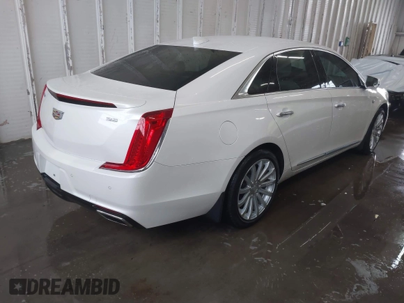 2018 Cadillac XTS Luxury z VIN 2G61M5S38J9156679, wystawiony jako IAAI lot #41574733 z przebiegiem 65 637 mil mil oraz . Historia ofert i sprzedaży dostępna na DreamBid. Obrazek 4.