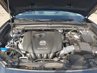 2021 Mazda CX-30 Premium with VIN 3MVDMBDM4MM238367, listed as a IAAI auction lot 42124335 with 31,120 mi miles and . Bid and sale history available at DreamBid. Image 10.