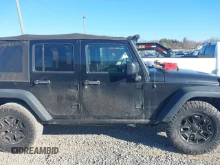 2016 Jeep Wrangler Unlimited Sport with VIN 1C4BJWDG0GL123581, listed as a IAAI auction lot 41426577 with 102,301 mi miles and . Bid and sale history available at DreamBid. Image 13.