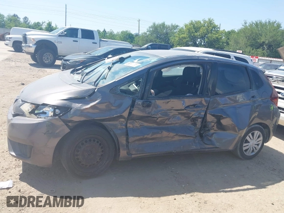 2016 Honda Fit LX z VIN JHMGK5H56GX041075, wystawiony jako IAAI lot #42023299 z przebiegiem 145 658 mil mil oraz . Historia ofert i sprzedaży dostępna na DreamBid. Obrazek 14.