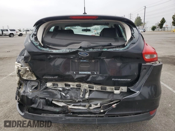 2015 Ford Focus Titanium z VIN 1FADP3N25FL324390, wystawiony jako Copart lot #59801805 z przebiegiem 97 615 mil mil oraz Szkoda całkowita • Salvage title. Historia ofert i sprzedaży dostępna na DreamBid. Obrazek 6.
