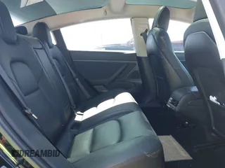 2020 Tesla Model 3 Standard Range Plus with VIN 5YJ3E1EAXLF614002, listed as a IAAI auction lot 41758898 with 42,363 mi miles and . Bid and sale history available at DreamBid. Image 8.