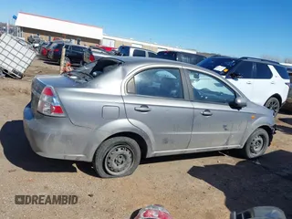 2007 Chevrolet Aveo LS z VIN KL1TD566X7B087387, wystawiony jako IAAI lot #41673057 z przebiegiem 160 577 mil mil oraz . Historia ofert i sprzedaży dostępna na DreamBid. Obrazek 14.