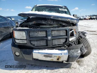 2010 Dodge Nitro Heat with VIN 1D4PU4GK4AW165374, listed as a Copart auction lot 45667655 with 142,086 mi miles and Salvage title. Bid and sale history available at DreamBid. Image 5.