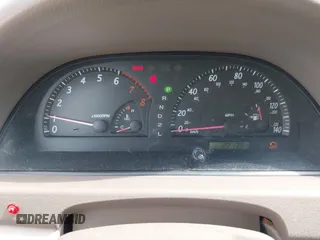 2002 Toyota Camry LE z VIN 4T1BE30K32U110304, wystawiony jako IAAI lot #42357455 z przebiegiem 221 389 mil mil oraz . Historia ofert i sprzedaży dostępna na DreamBid. Obrazek 7.