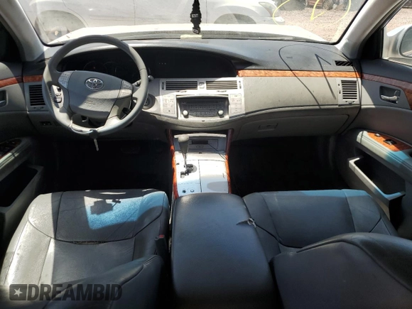 2007 Toyota Avalon XL z VIN 4T1BK36B77U194327, wystawiony jako Copart lot #57345135 z przebiegiem 189 484 mil mil oraz Szkoda całkowita • Salvage title. Historia ofert i sprzedaży dostępna na DreamBid. Obrazek 8.
