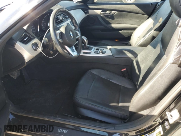 2015 BMW Z4 sDrive28i with VIN WBALL5C54FP557726, listed as a Copart auction lot 87249074 with 64,856 mi miles and Salvage Title. Bid and sale history available at carsss.com. Image 7.