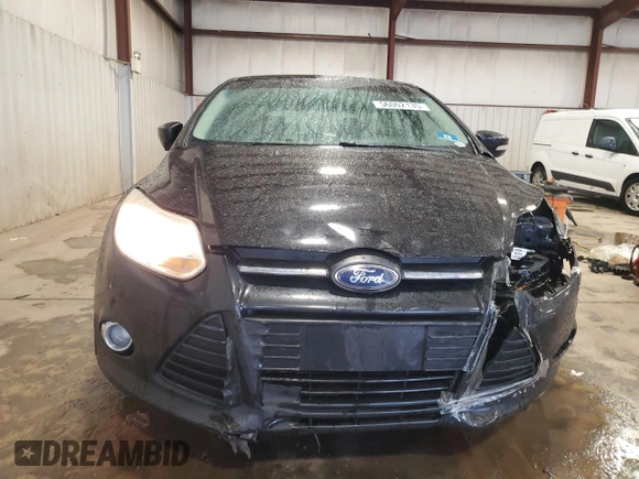 2012 Ford Focus SE z VIN 1FAHP3K24CL407570, wystawiony jako Copart lot #56002135 z przebiegiem 122 730 mil mil oraz Szkoda całkowita • Salvage title. Historia ofert i sprzedaży dostępna na DreamBid. Obrazek 5.