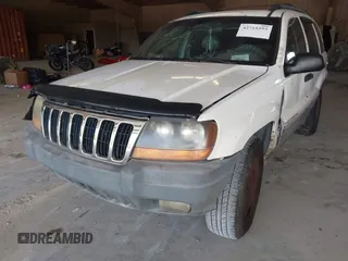 2000 Jeep Grand Cherokee Laredo with VIN 1J4G248S7YC363891, listed as a IAAI auction lot 42715393 with 238,686 mi miles and . Bid and sale history available at DreamBid. Image 10.