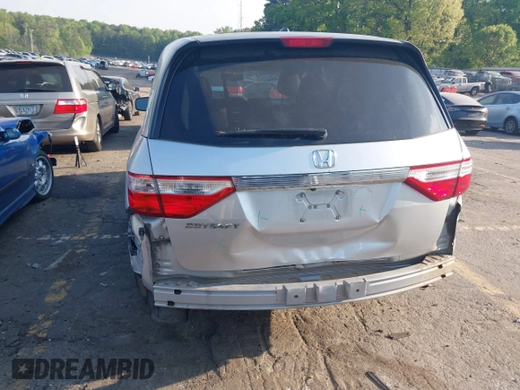 2013 Honda Odyssey EX-L with VIN 5FNRL5H6XDB084016, listed as a IAAI auction lot 42044300 with 156,296 mi miles and . Bid and sale history available at carsss.com. Image 6.
