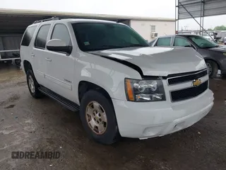 2013 Chevrolet Tahoe LS with VIN 1GNSCAE05DR276326, listed as a IAAI auction lot 41894489 with 173,183 mi miles and . Bid and sale history available at DreamBid. Image 1.