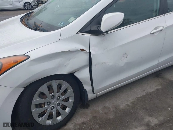 2016 Hyundai Elantra GT with VIN KMHD35LH5GU304625, listed as a IAAI auction lot 42003220 with 96,147 mi miles. Bid and sale history available at carsss.com. Image 12.