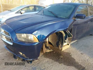 2014 Dodge Charger SXT with VIN 2C3CDXHGXEH330845, listed as a IAAI auction lot 41858714 with 161,541 mi miles. Bid and sale history available at carsss.com. Image 6.