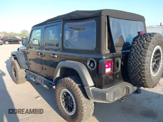 2018 Jeep Wrangler Unlimited Sport S z VIN 1C4HJXDG9JW169478, wystawiony jako IAAI lot #40387425 z przebiegiem 59 287 mil mil oraz . Historia ofert i sprzedaży dostępna na DreamBid. Obrazek 3.
